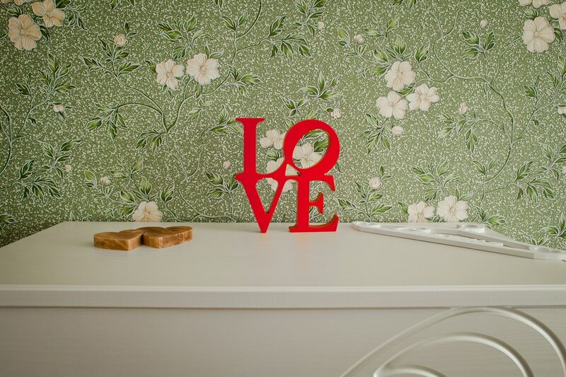 Red Love Sign on Table