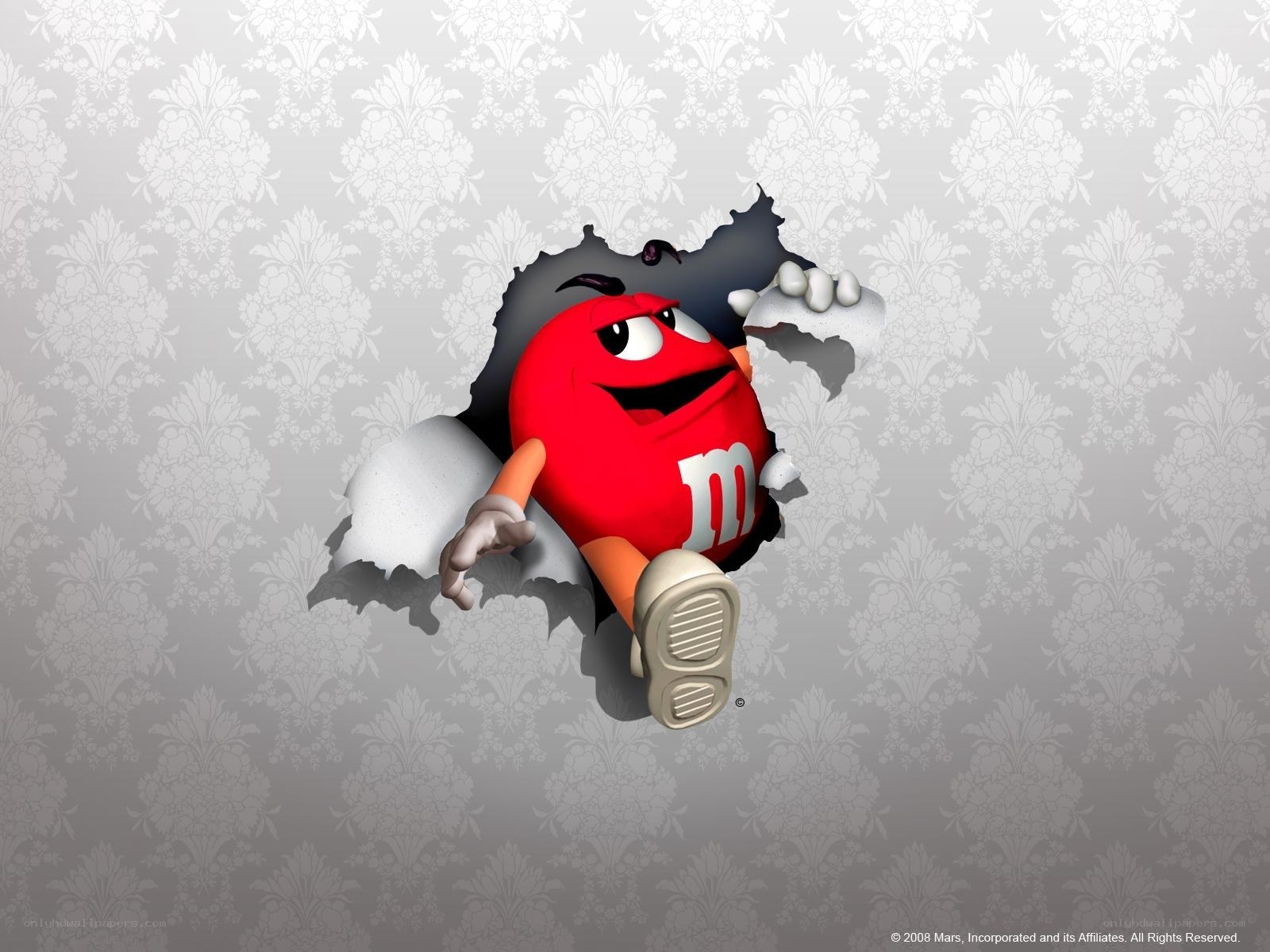 Red M&M breaking through wall