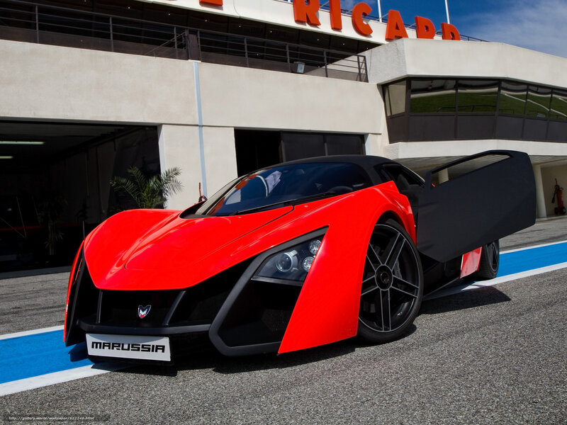 Red Marussia sports car on track