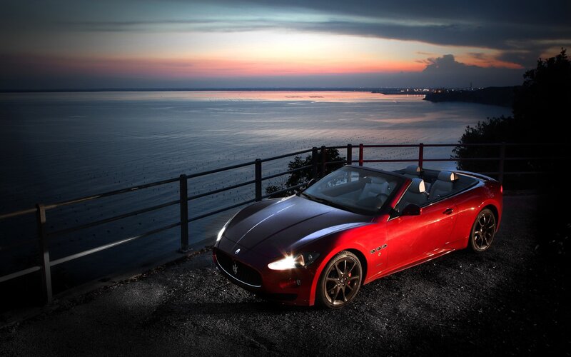 Red Maserati at sunset