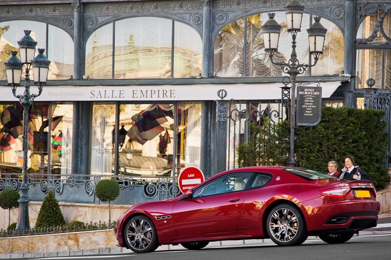 Red Maserati on a city street
