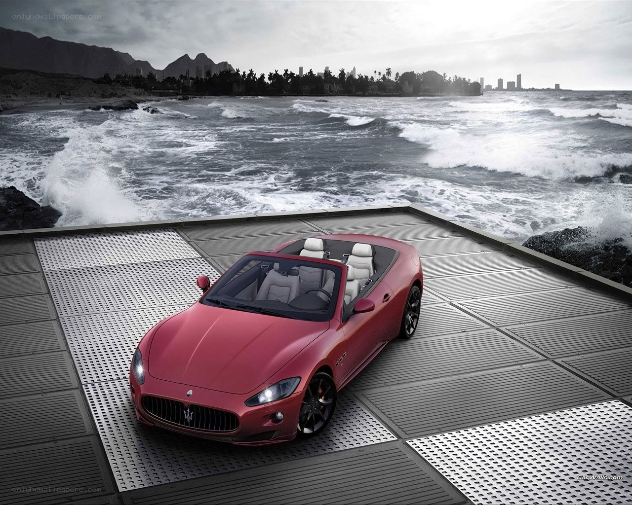 Red Maserati on coastal platform