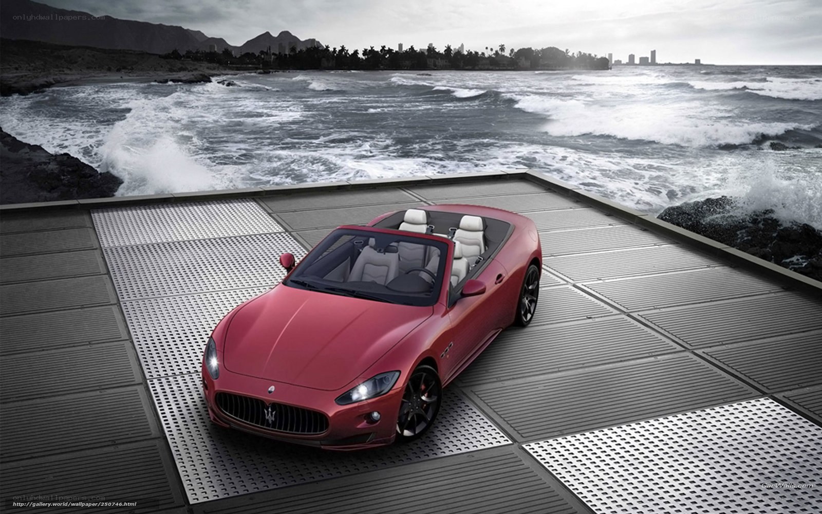 Red Maserati on coastal platform