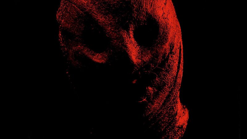 Red Mask in Darkness