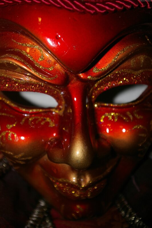 red mask with gold details