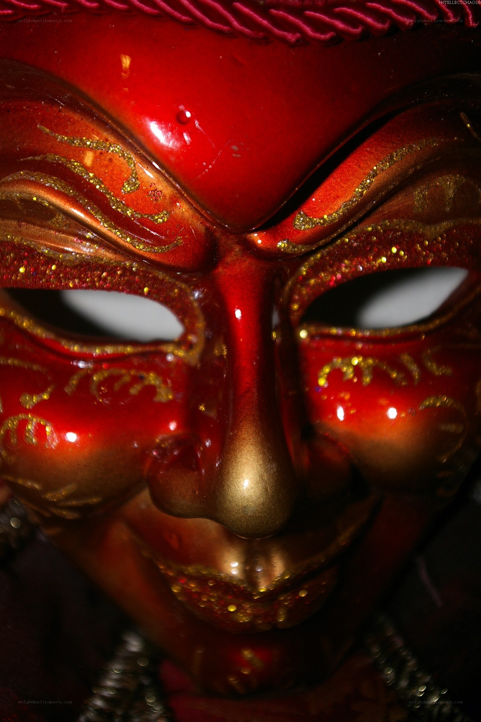red mask with gold details