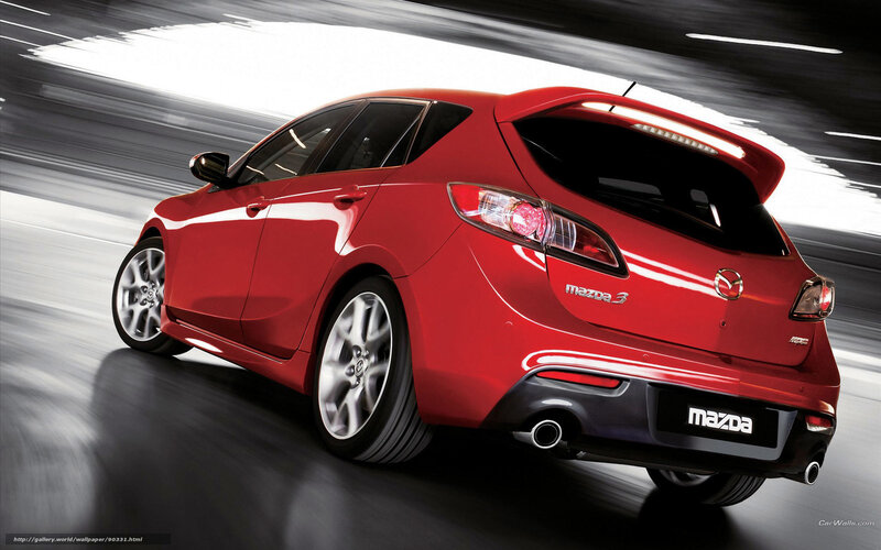 Red Mazda 3 Hatchback — Dynamic, Photograph