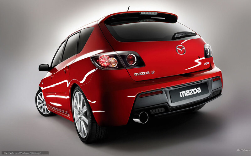 Red Mazda 3 hatchback rear view