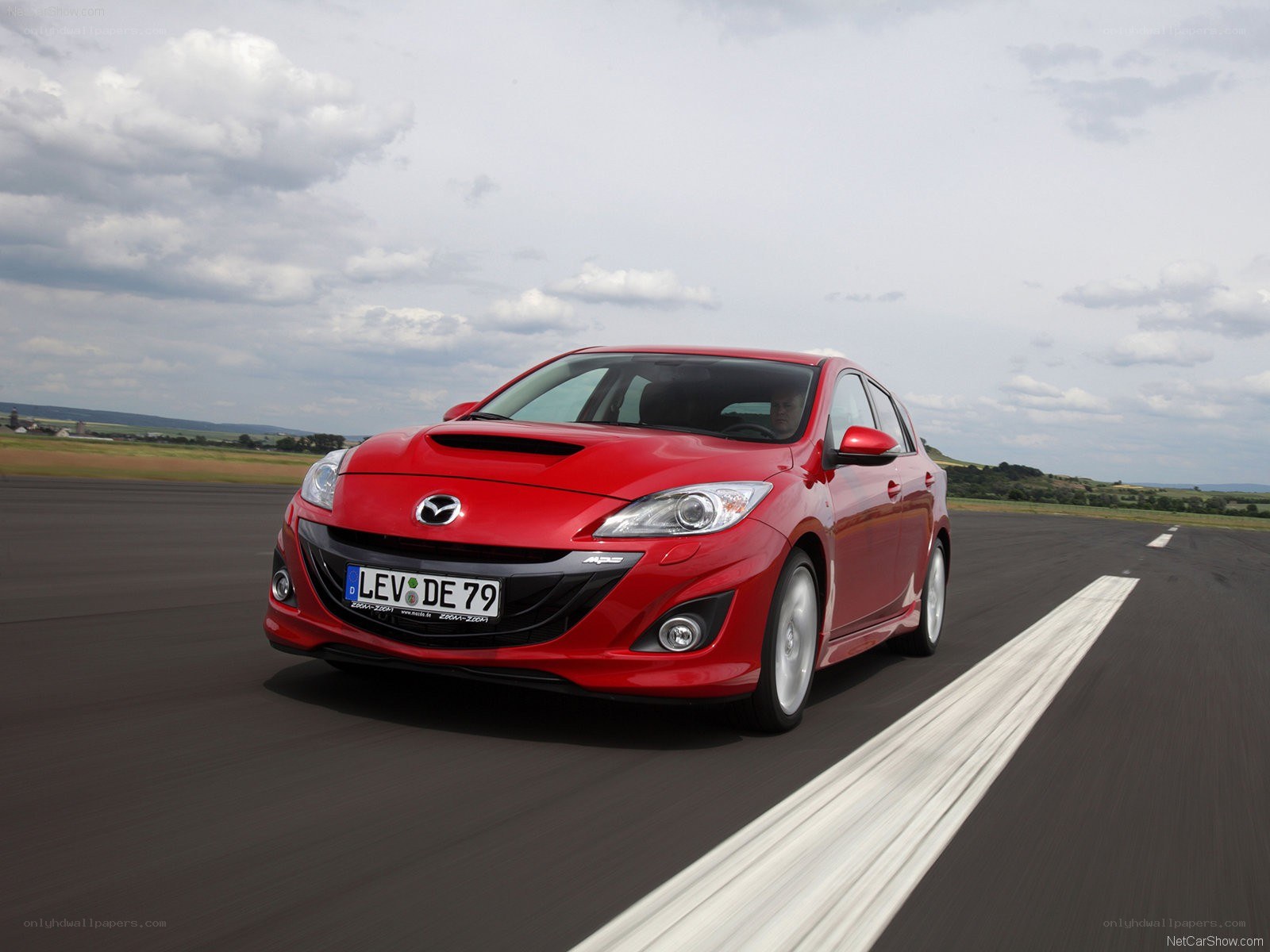 Red Mazda 3 MPS on a racetrack