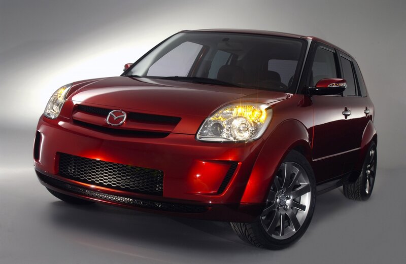 Red Mazda compact car