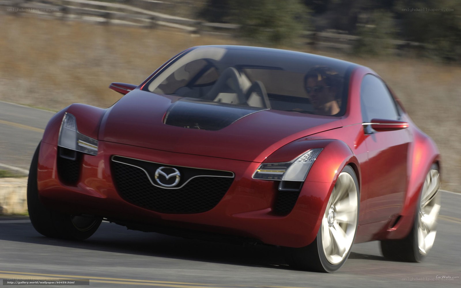 Red Mazda concept car in motion