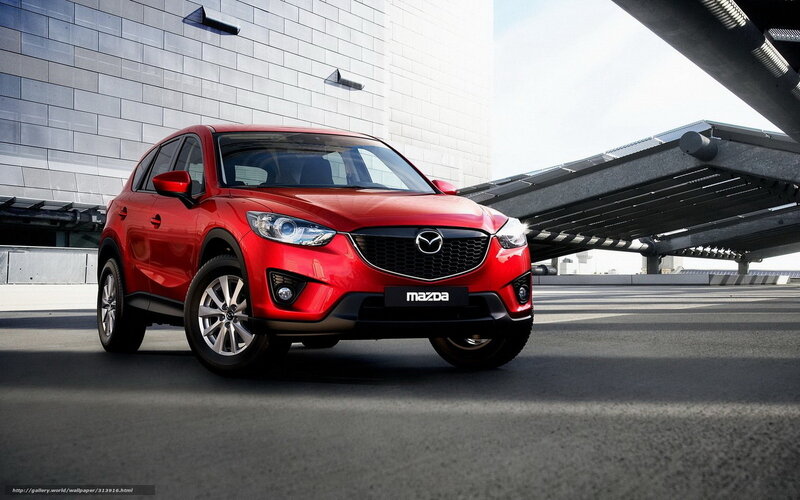 Red Mazda CX-5 in urban setting