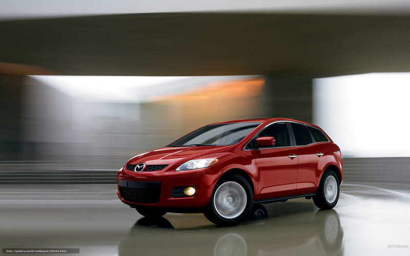 Red Mazda CX-7 in motion