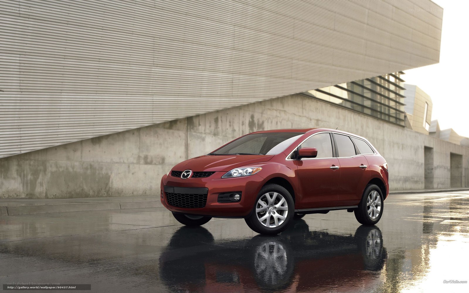 Red Mazda CX-7 in urban setting