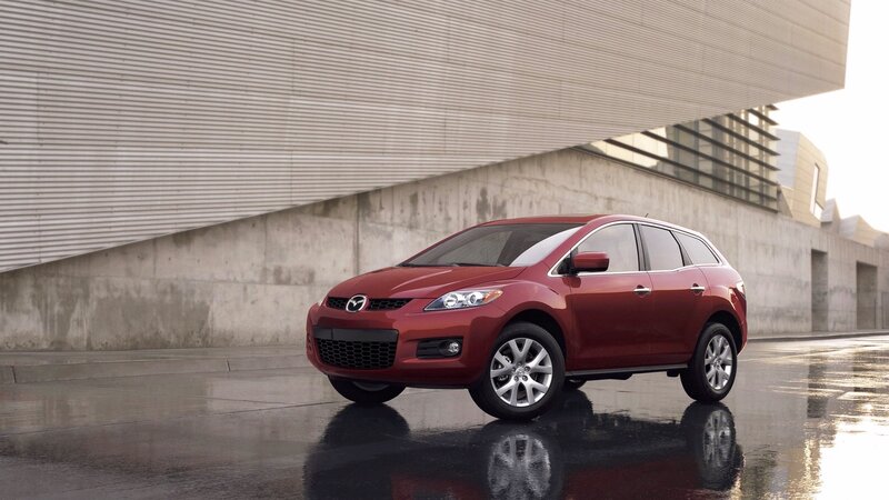 Red Mazda CX-7 parked outside