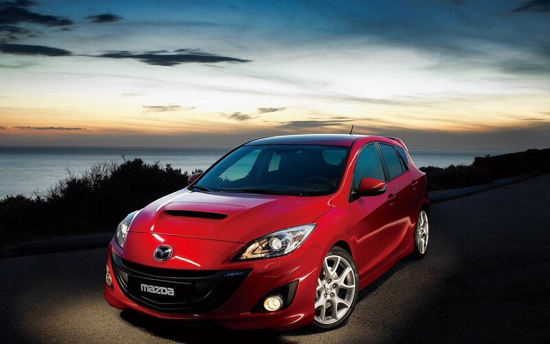 Red Mazda Hatchback — Dramatic, Sunset