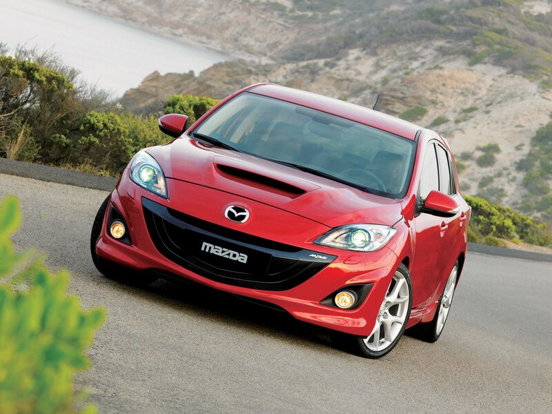 Red Mazda Hatchback — Dynamic, Afternoon, Photograph