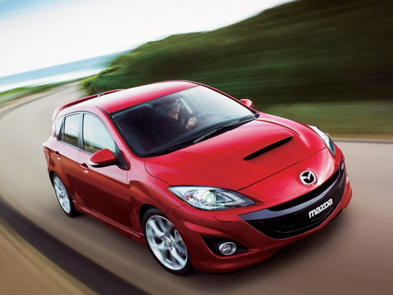 Red Mazda Hatchback — Dynamic, Afternoon