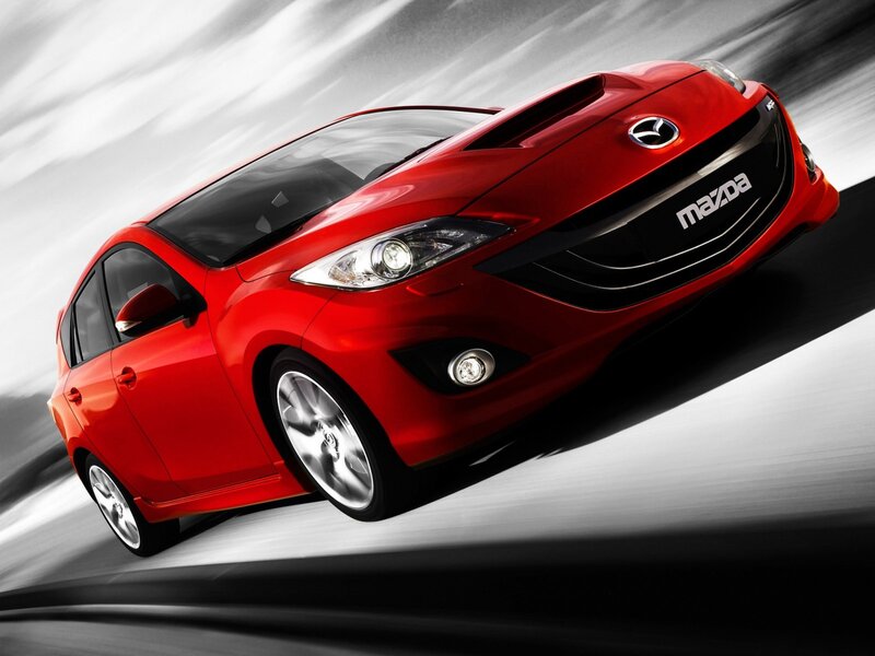 Red Mazda Hatchback — Dynamic, Photograph