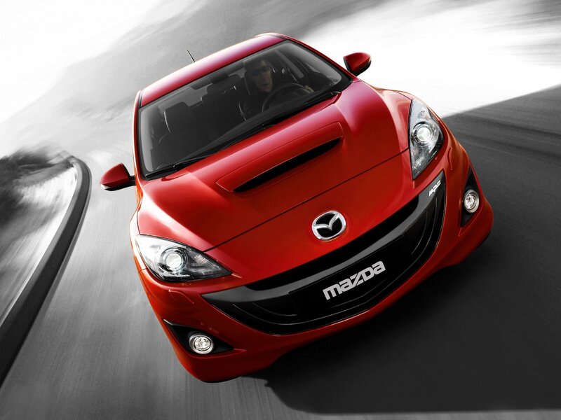 Red Mazda Hatchback — Dynamic