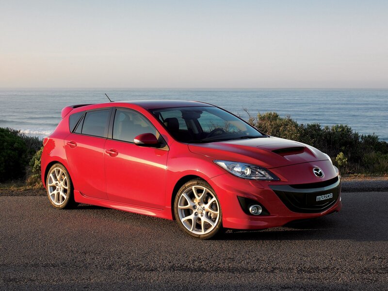 Red Mazda Hatchback — Serene