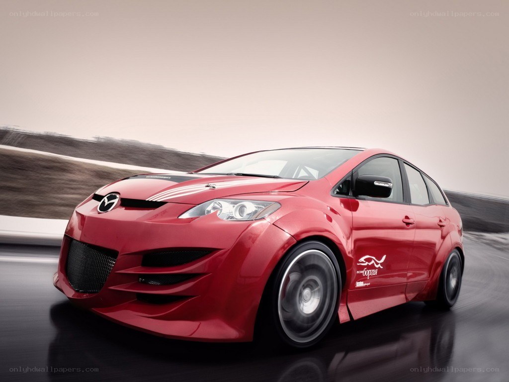 Red Mazda race car on track