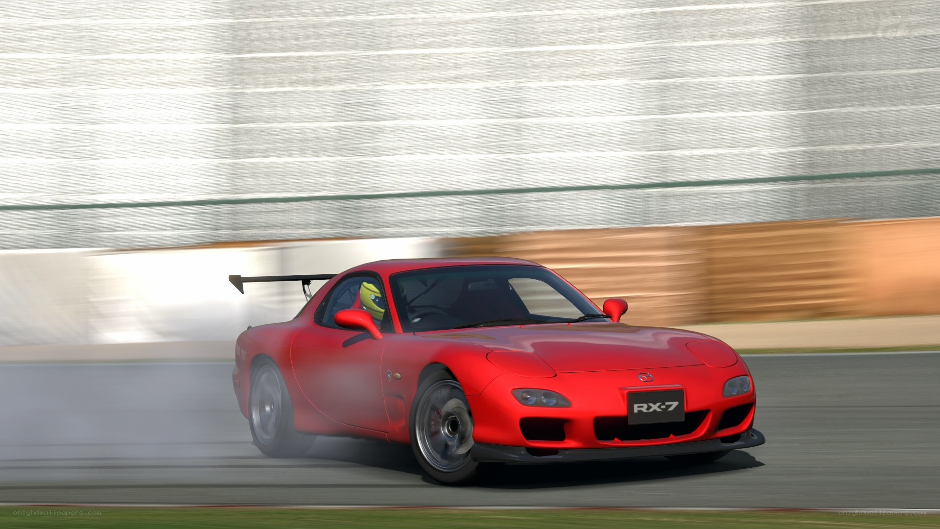 Red Mazda RX-7 on a racetrack