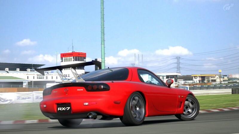 Red Mazda RX-7 on Track