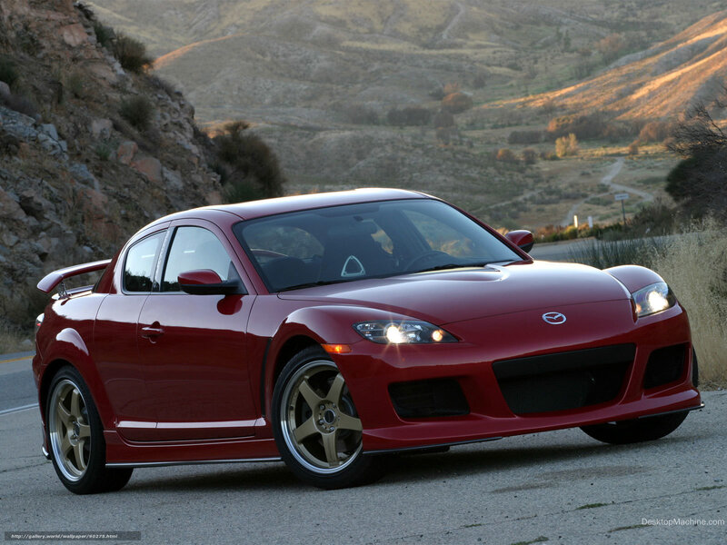 Red Mazda RX-8 on a mountain road