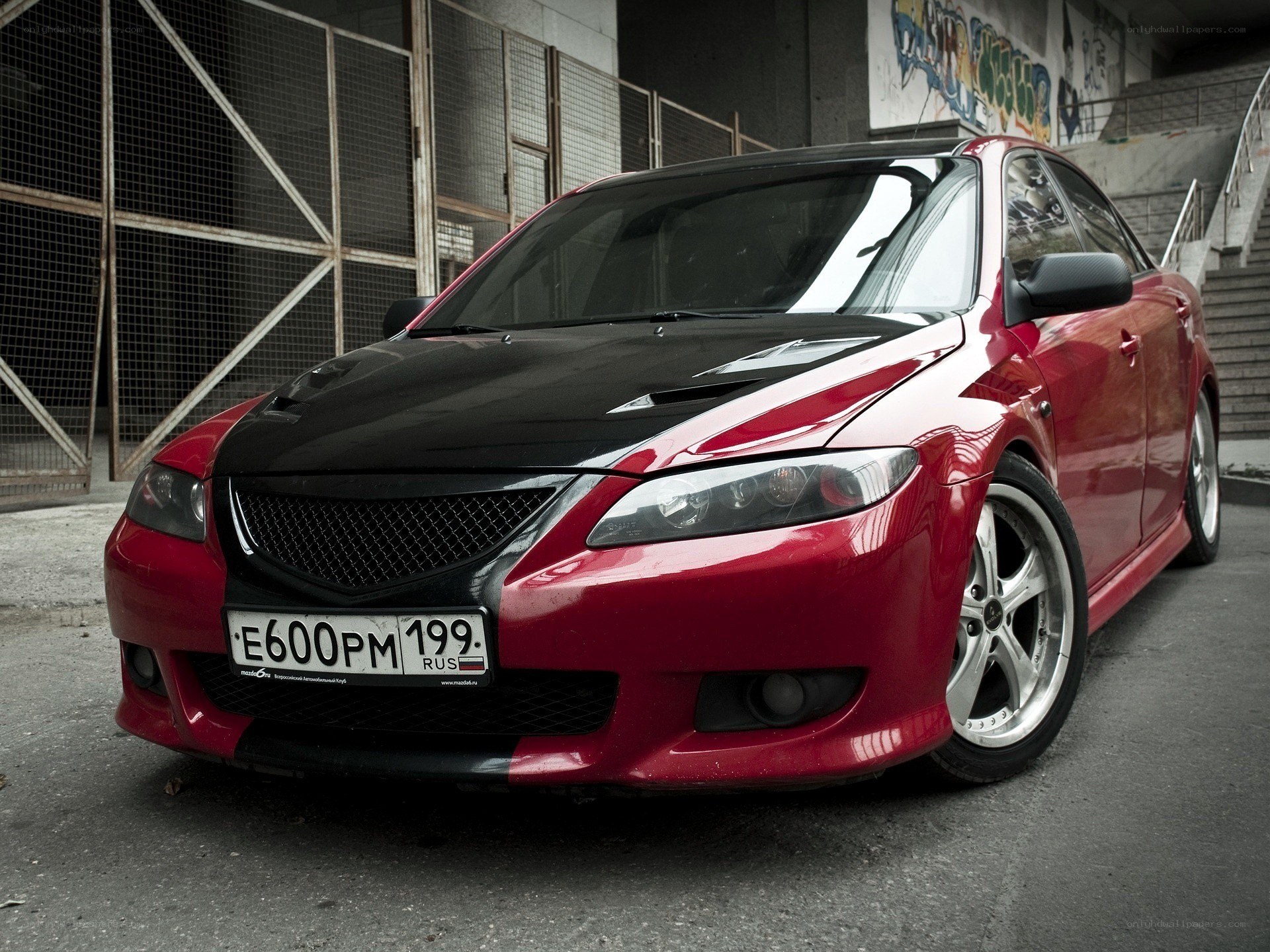 red mazda with black hood