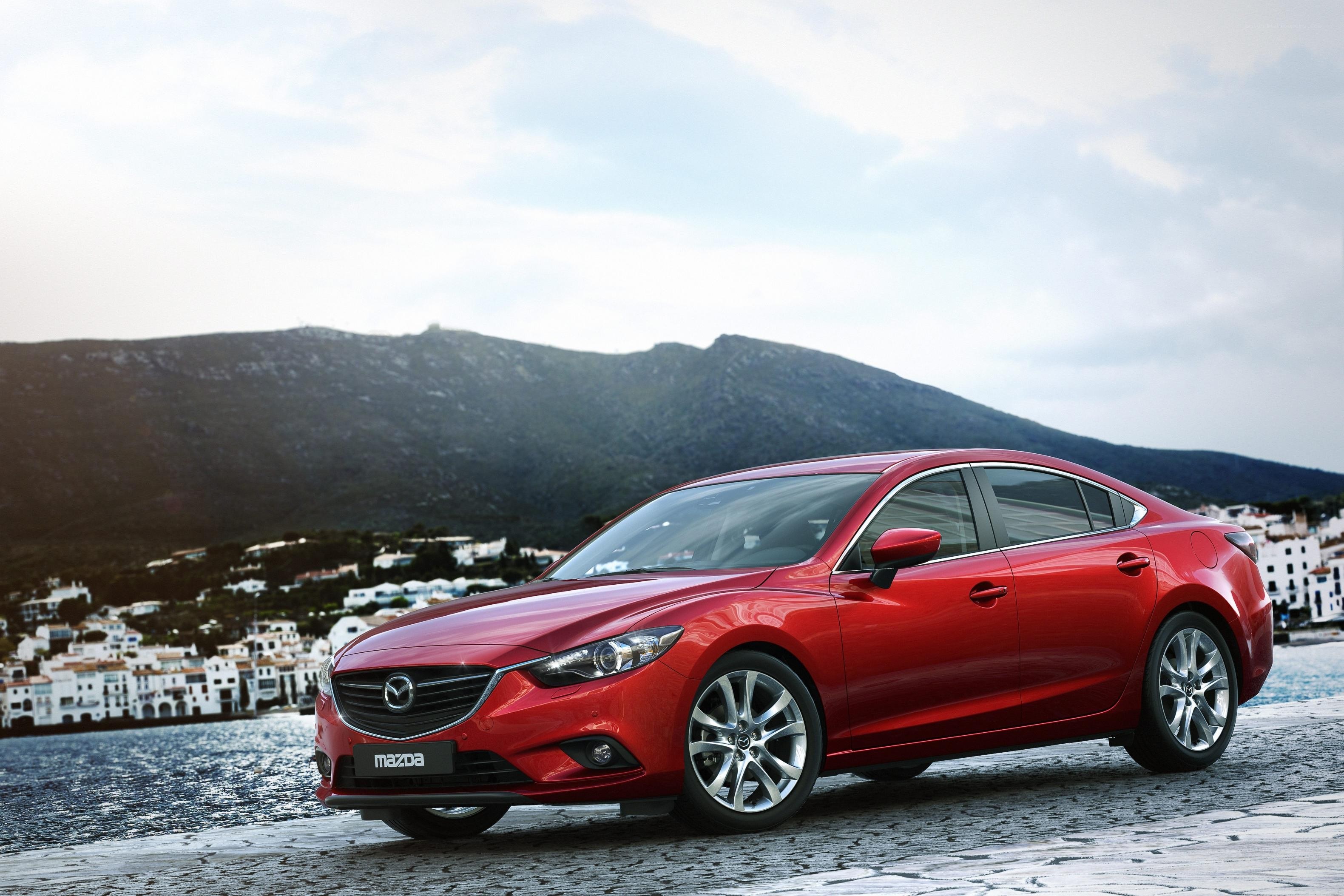 Red Mazda6 by the coast