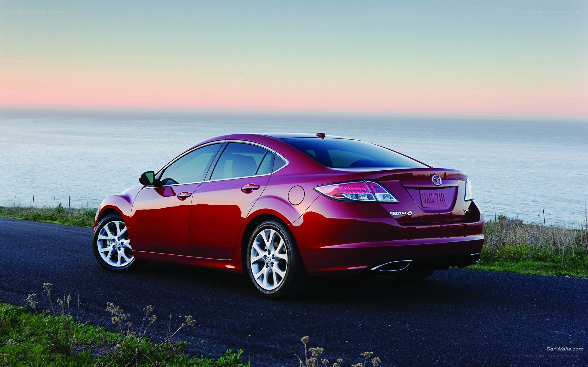 Red Mazda6 by the ocean