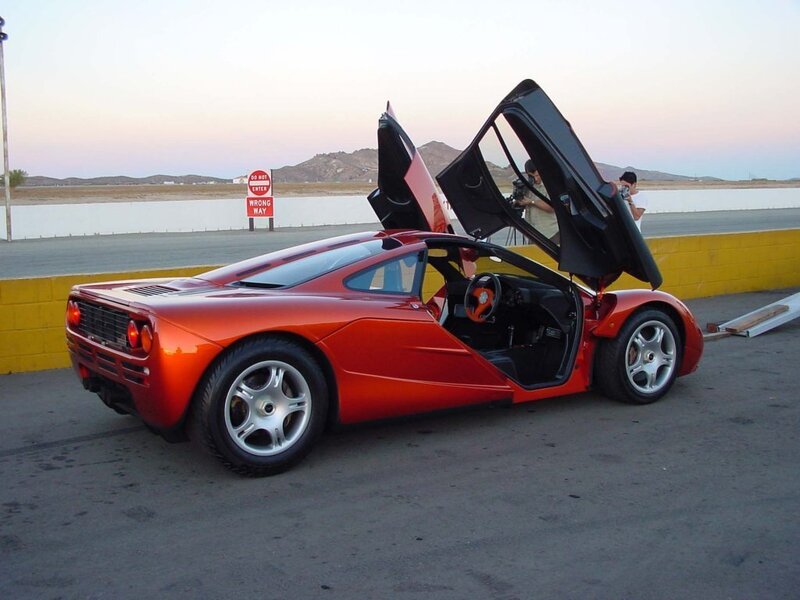 Red McLaren F1 with doors open