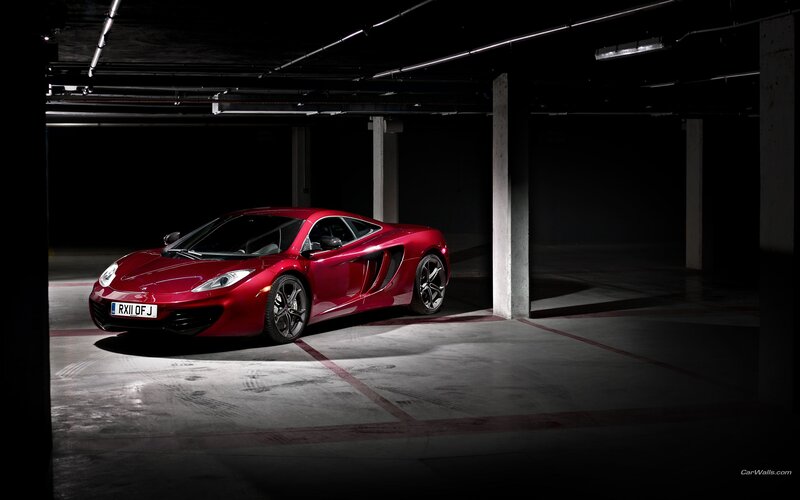 Red McLaren in parking garage