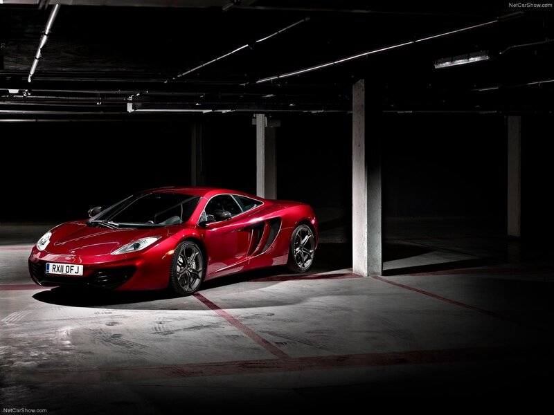 Red McLaren MP4-12C in garage