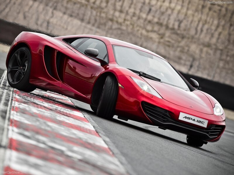Red McLaren MP4-12C on track