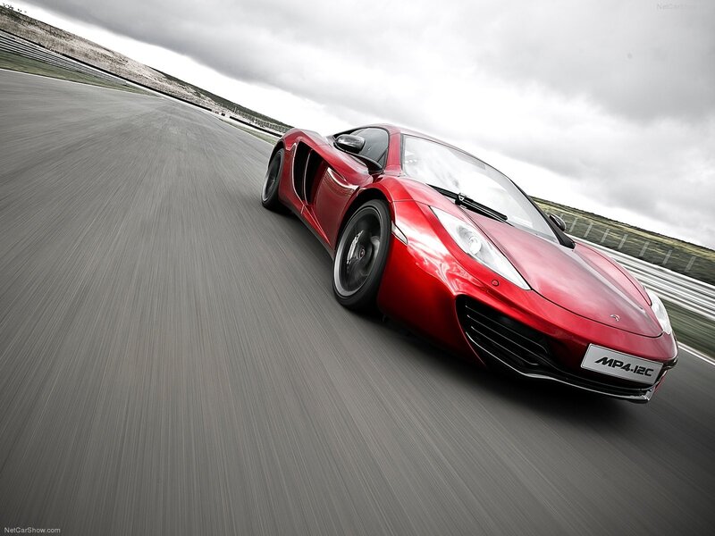 Red McLaren MP4-12C on track