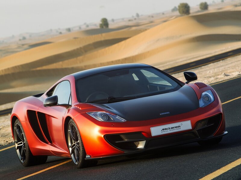 Red McLaren on desert road