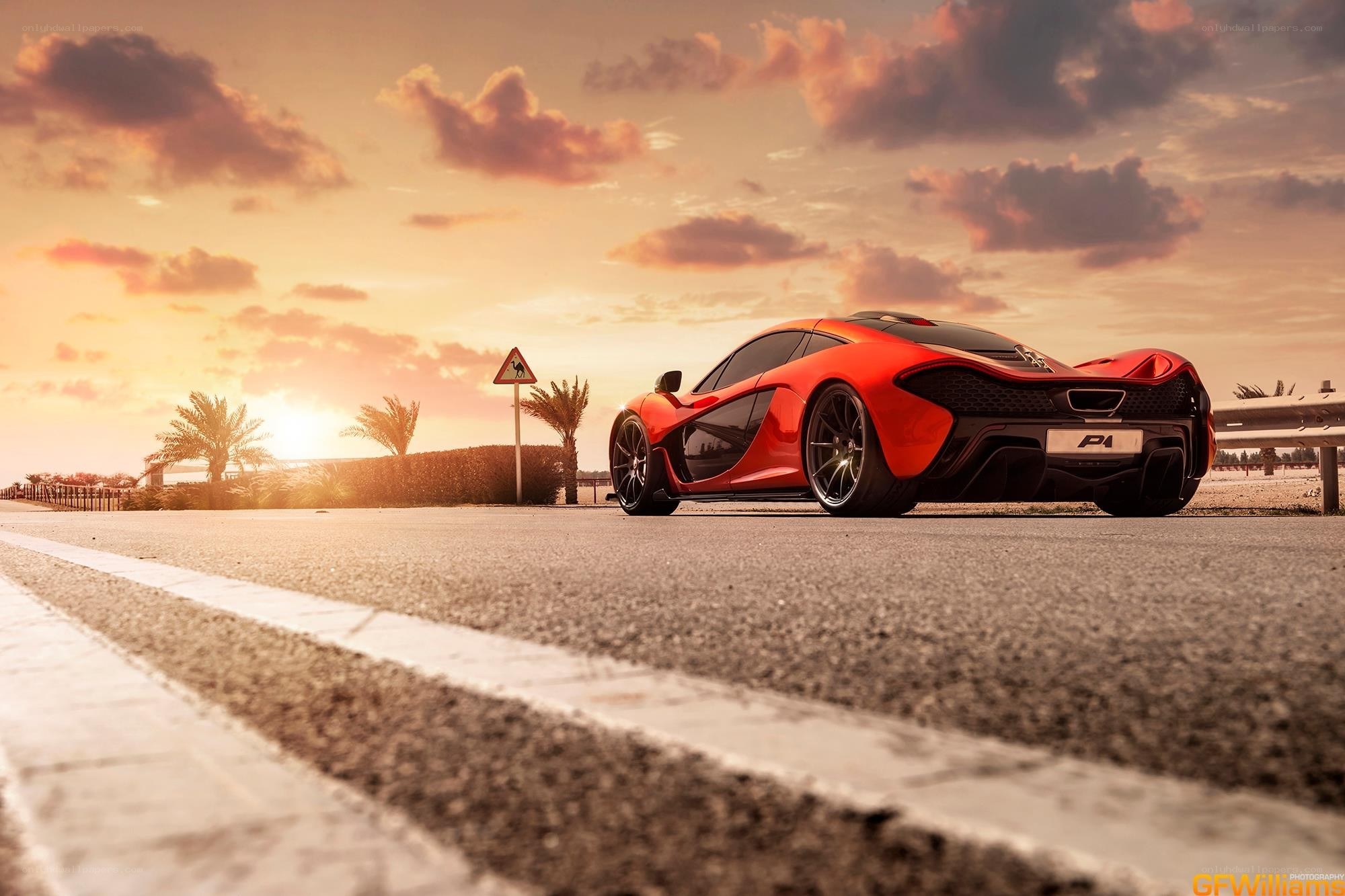 Red McLaren P1 at sunset