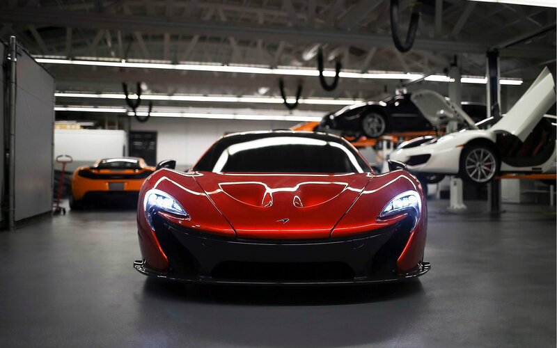 Red McLaren P1 in a garage