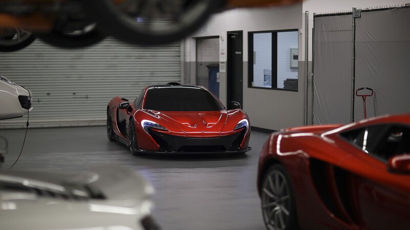 Red McLaren P1 in garage
