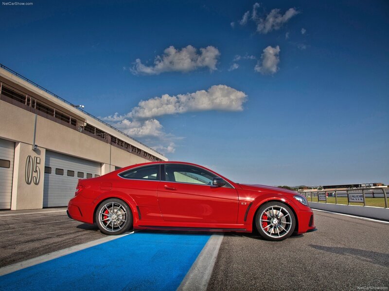 Red Mercedes-AMG C63 on a racetrack