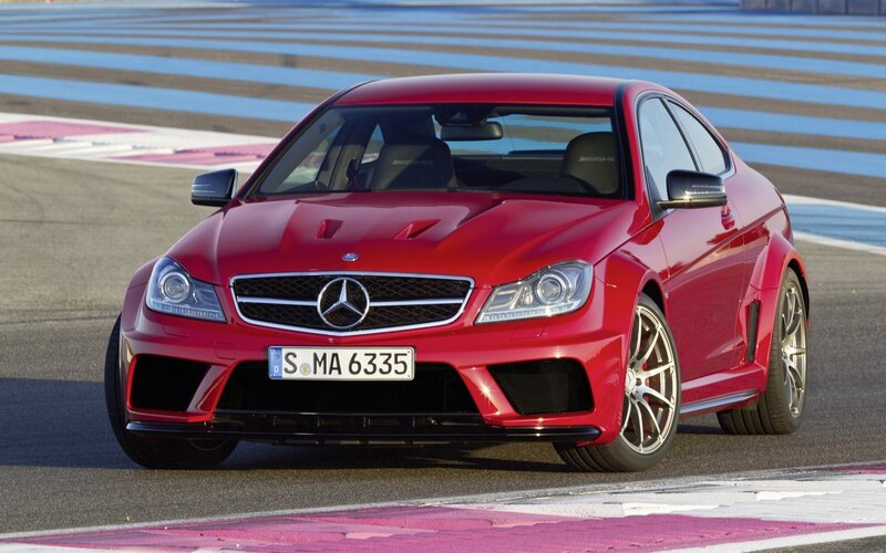 Red Mercedes-AMG C63 on a racetrack