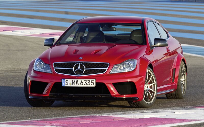 red mercedes-amg on racetrack
