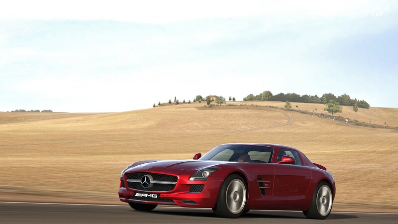 Red Mercedes-AMG SLS driving