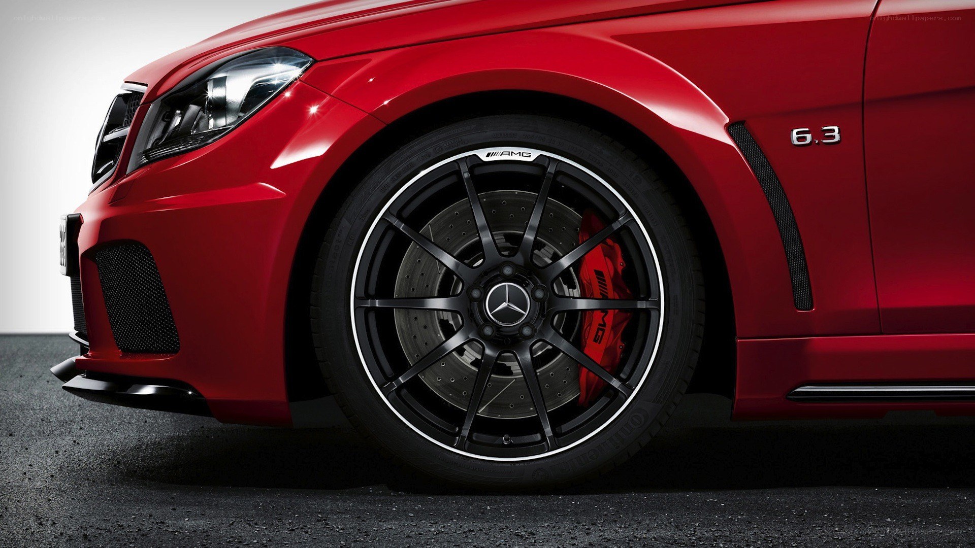 red mercedes-amg wheel