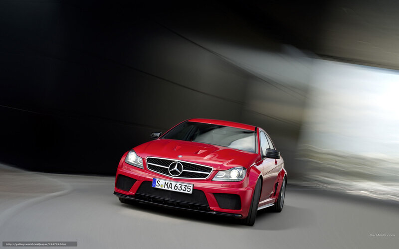 Red Mercedes-Benz C63 AMG in motion