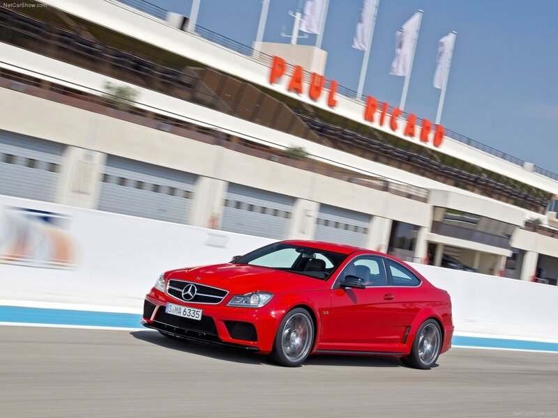 Red Mercedes-Benz C63 AMG on a racetrack