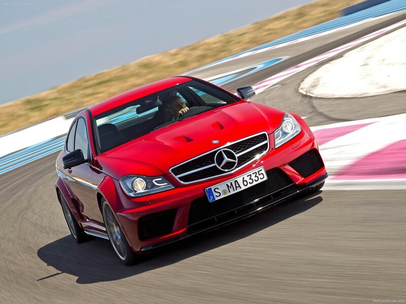 Red Mercedes-Benz C63 AMG on track