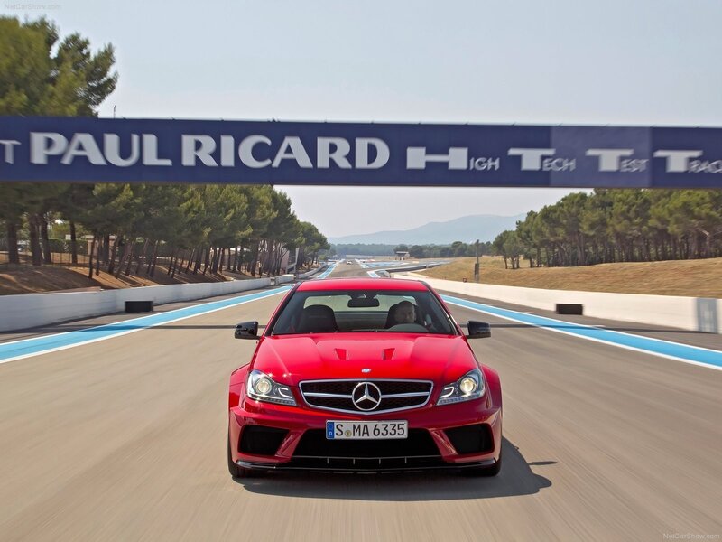 Red Mercedes-Benz C63 AMG on track
